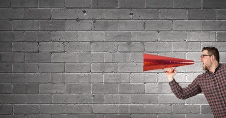 Guy make announcement in trumpet