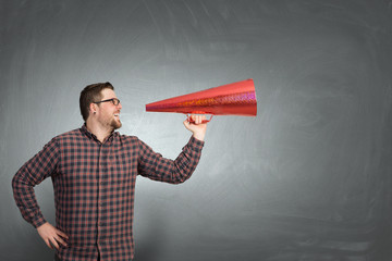 Guy make announcement in trumpet