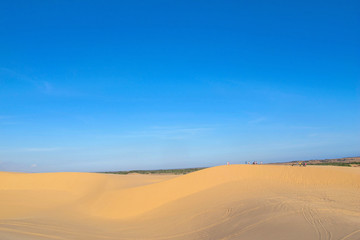 Fototapeta na wymiar white sand dune desert and lake in Mui Ne, Vietnam