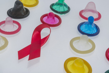 colorful condoms with red bow
