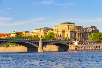 Obraz premium View of the Vltava River and the bridges shined with the sunset sun, Prague, the Czech Republic