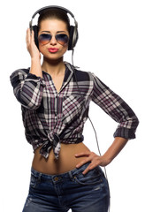 Young woman in jeans listen music
