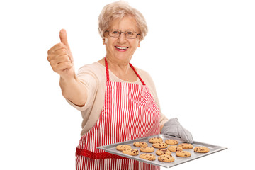 Mature lady holding chocloate chip cookies