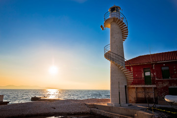 Lighthouse in Zadar at sunset © xbrchx