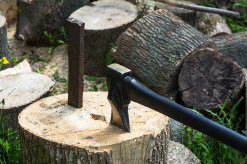 Chopping firewood with an axe