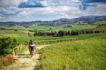 Wall murals Toscane Mountain bikers on touristic trail in Tuscany (Italy)