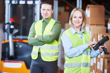 Warehouse Management System. Worker with barcode scanner