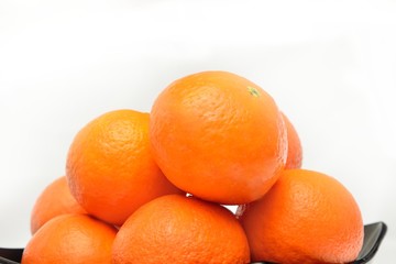 many fresh unrefined organic mandarin (tangerines)