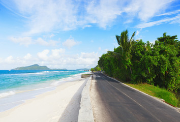 The road along the ocean's beach, Mahe, Seychelles.