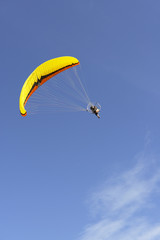 Paragliding in the sky and clouds