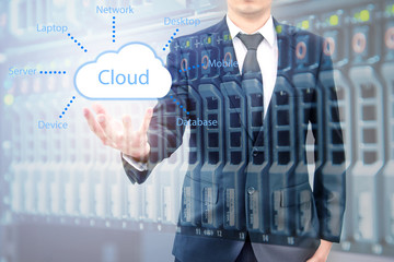 Double exposure of cloud computing concept on hand of a businessman with servers computing technology in datacenter creative cloud concept