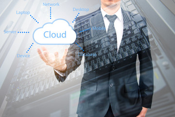Double exposure of cloud computing concept on hand of a businessman with servers computing technology in datacenter creative cloud concept