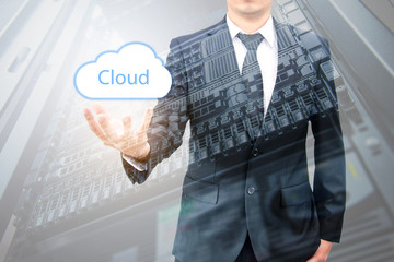 Double expoure of cloud computing concept on hand of a businessm