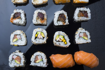 Sushi set isolated on black background