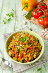 Grilled vegetables salad with yellow and red bell pepper, eggpla