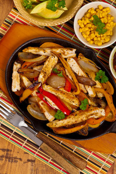 Chicken Fajitas with Grilled Onions and Bell Peppers. Selective focus.