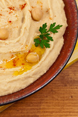 Healthy Homemade Hummus with Olive Oil. Selective focus.
