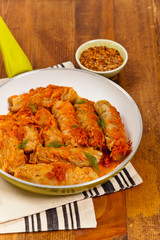 Stuffed Cabbage with tomato sauce. Selective focus.