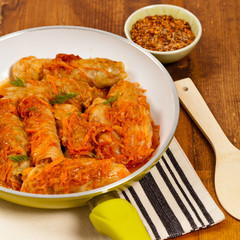 Stuffed Cabbage with tomato sauce. Selective focus.