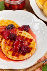 Waffles with Fresh Strawberry Syrup. Selective focus.