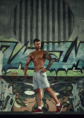 Obraz na płótnie Canvas Men's physique. Champion. Bodybuilder.