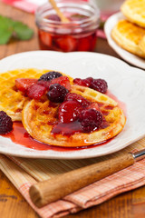 Waffles with Fresh Strawberry Syrup. Selective focus.