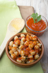 cooked chickpeas with tomatoes in a bowl