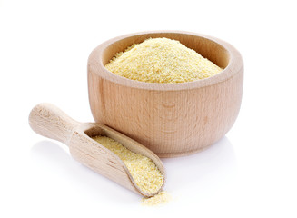 Corn grits in wooden bowl