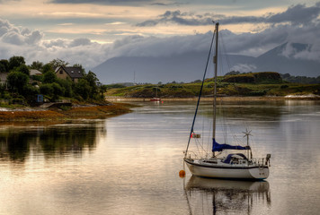 Fototapeta na wymiar Sailing boat in Dunstaffnage Bay, Highlands, Scotland
