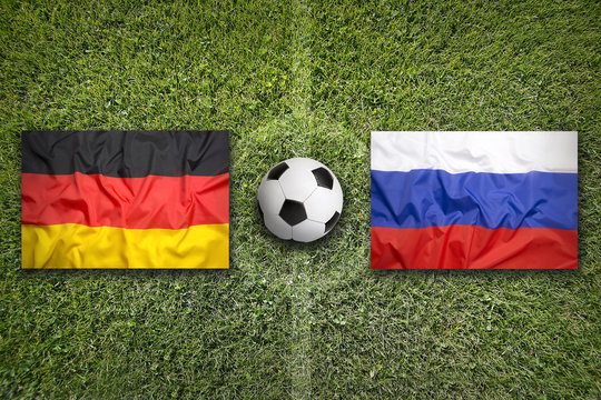 Germany vs. Russia flags on soccer field