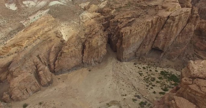 Aerial drone scene of big canyon. Piedra parada, Argentina. Camera goes from great valley to a small canyon structure, from panoramic view to top visual. Rock landscape, monumental views.