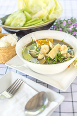 Laos curry  (Thai call Kaeng Nor Mai Sai Biyanang or Kaeng Lao or Tom Prer) baby bamboo pumpkin and mixed vegetable Shoot Soup the traditional delicious Northeastern Style Thai food.