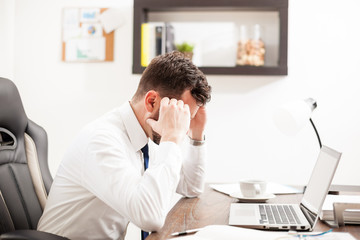 Frustrated businessman in an office