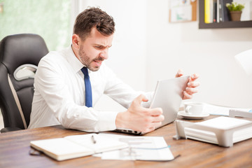 Fototapeta premium Businessman with a slow internet connection