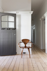 Simple decor of classic wooden chair in apartment entry
