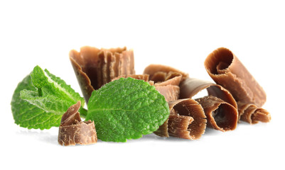 Chocolate shavings with mint on white background