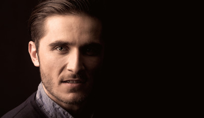 Naklejka premium young man close up portrait