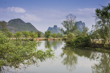 The beautiful karst mountains and rural scenery in spring

