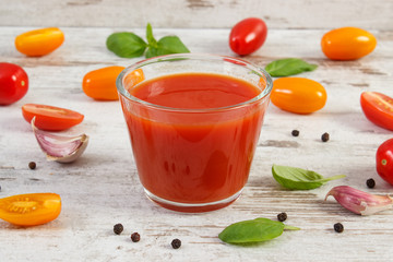 Tomato juice and vegetables with spices, healthy nutrition