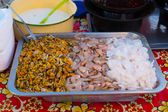 Fresh mant seafood ready for cooking fried mussel pancakes in lo