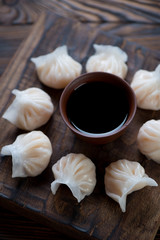 Closeup of steamed dim-sums with prawns, selective focus
