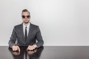 Businessman sitting at office desk