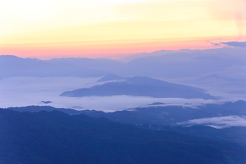 Skyline with mist and mountain.