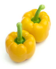 Group of sweet yellow peppers isolated on white background