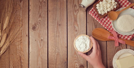 Farm fresh dairy products on wooden background. Healthy eating concept. View from above. Flat lay