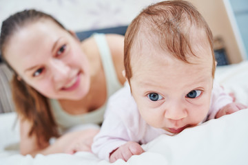 newborn baby with mother