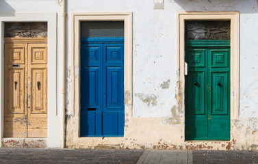 Three different color doors