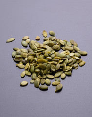 pumpkin seeds on black table