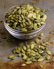 pumpkin seeds in a glass bowl