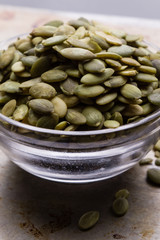 pumpkin seeds in a glass bowl
